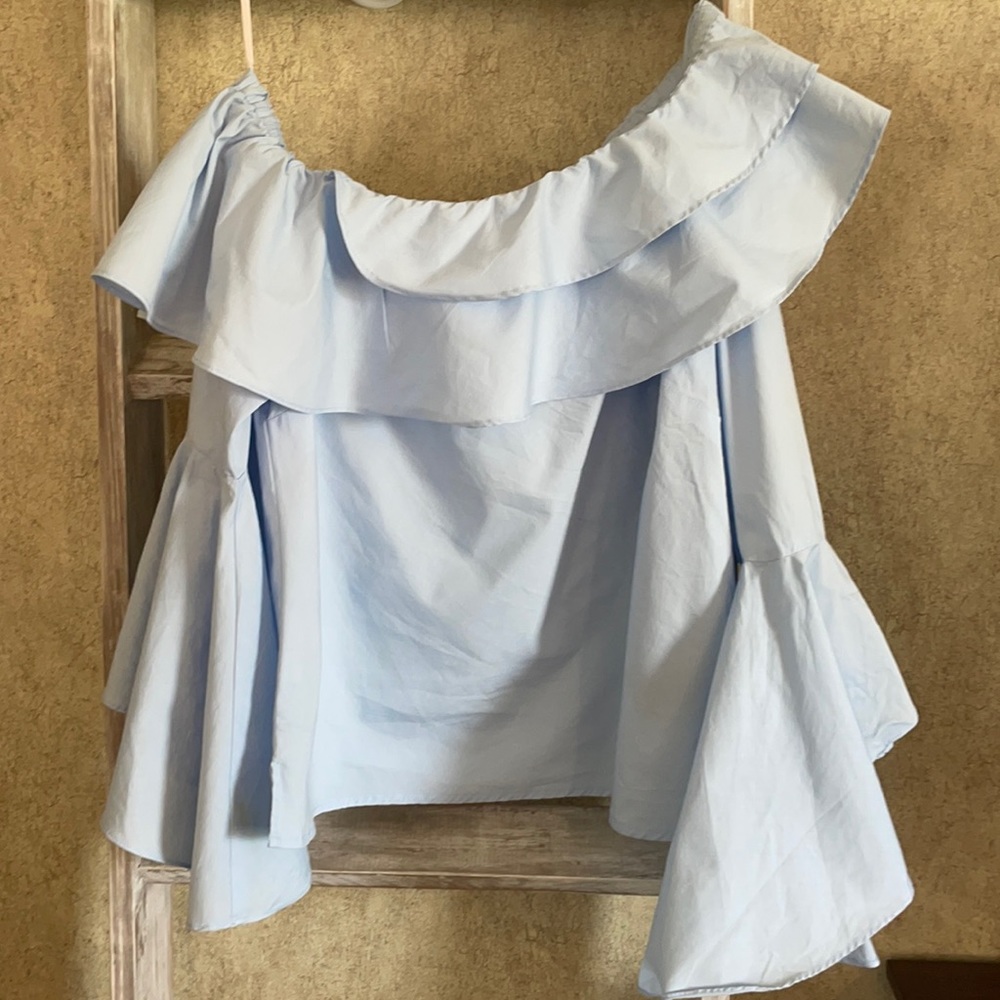 Bebe medium light blue ruffle off the shoulder top. Gorgeous.